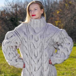 Hand knitted sweater in beige